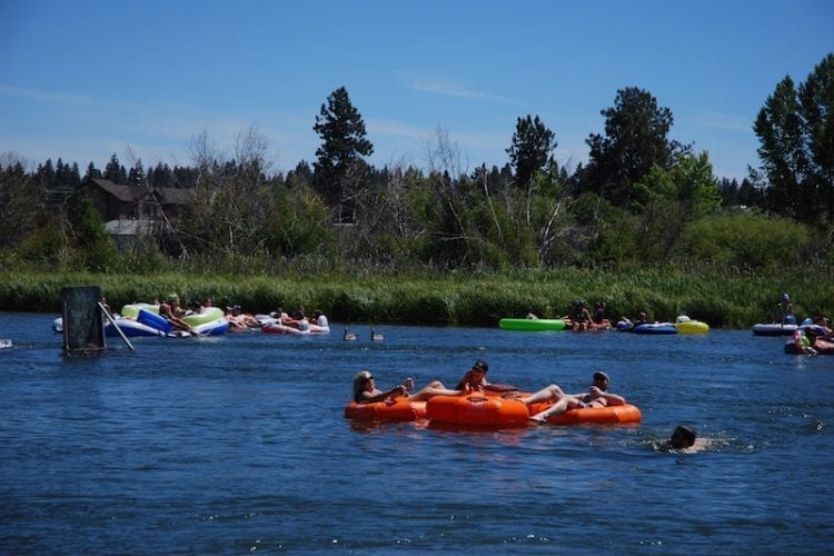 Families floating the Deschutes RIver in Bend, Oregon.