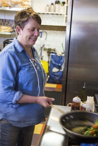 Chef Bethlyn Rider in the kitchen at Global Fusion in Bend, Oregon.