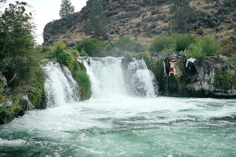 Cliff jumping at Steelhead Falls in Central Oregon