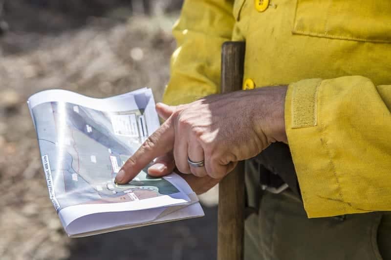 A firefighter works on a prescribed burn in Central Oregon