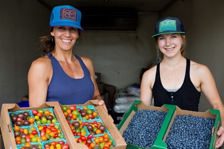 Liz Weigand, left, co-owner of Agricultural Connections in Bend, Oregon