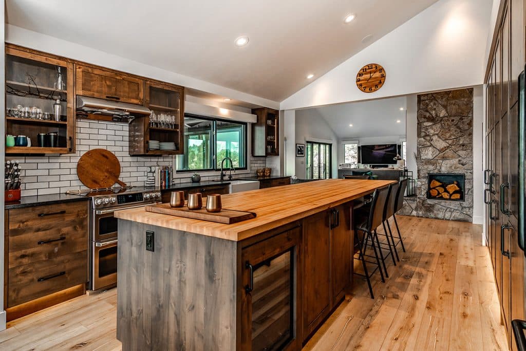 Rustic kitchen island in cliffside retreat home.