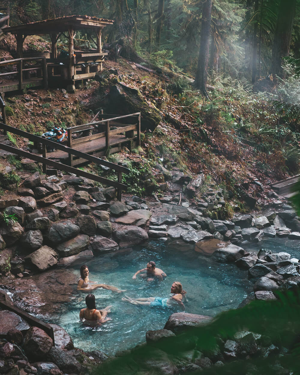 4 people enjoying Cougar Hot Springs