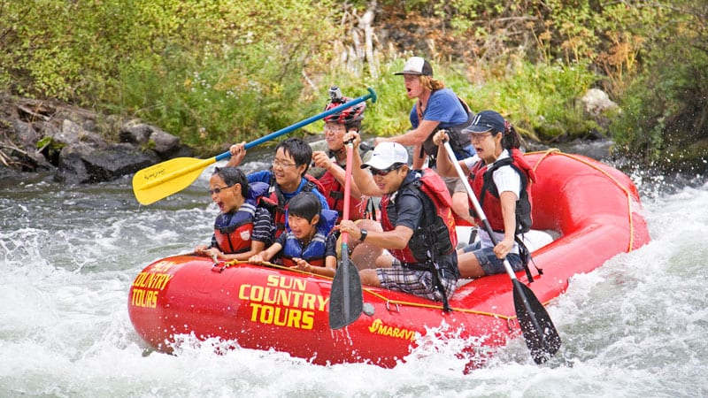 Sun Country Tours group whitewater rafting
