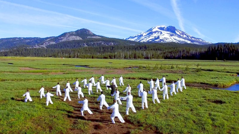Students practicing Tai Chi near Sparks Lake