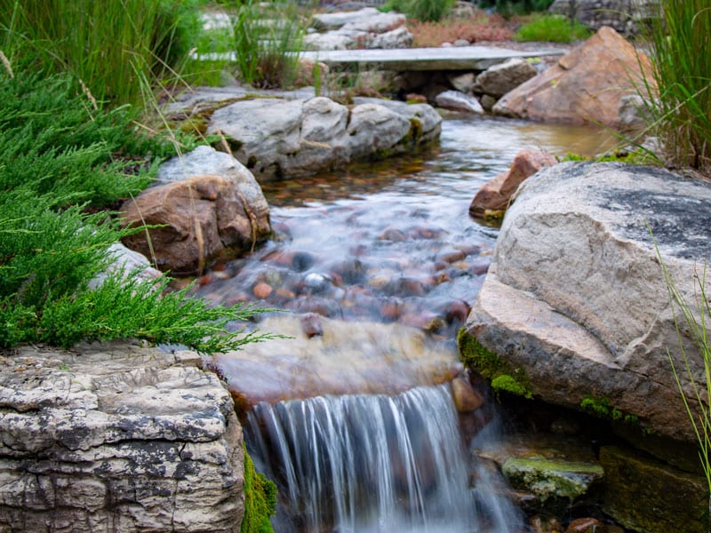 Falling waters in an outdoor space