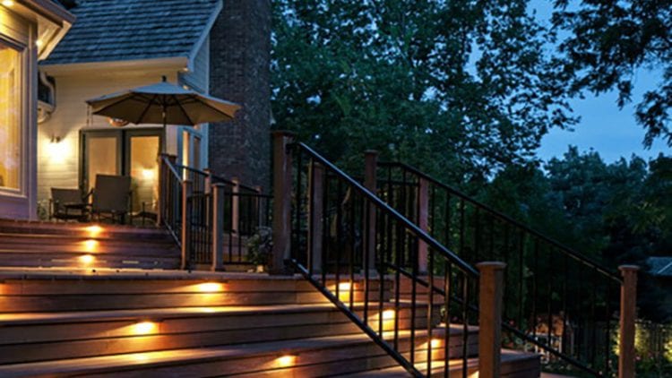 Stair lighting lights the way up to the house