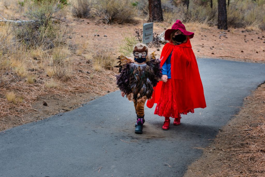 Kid in which costume with kid in owl costume