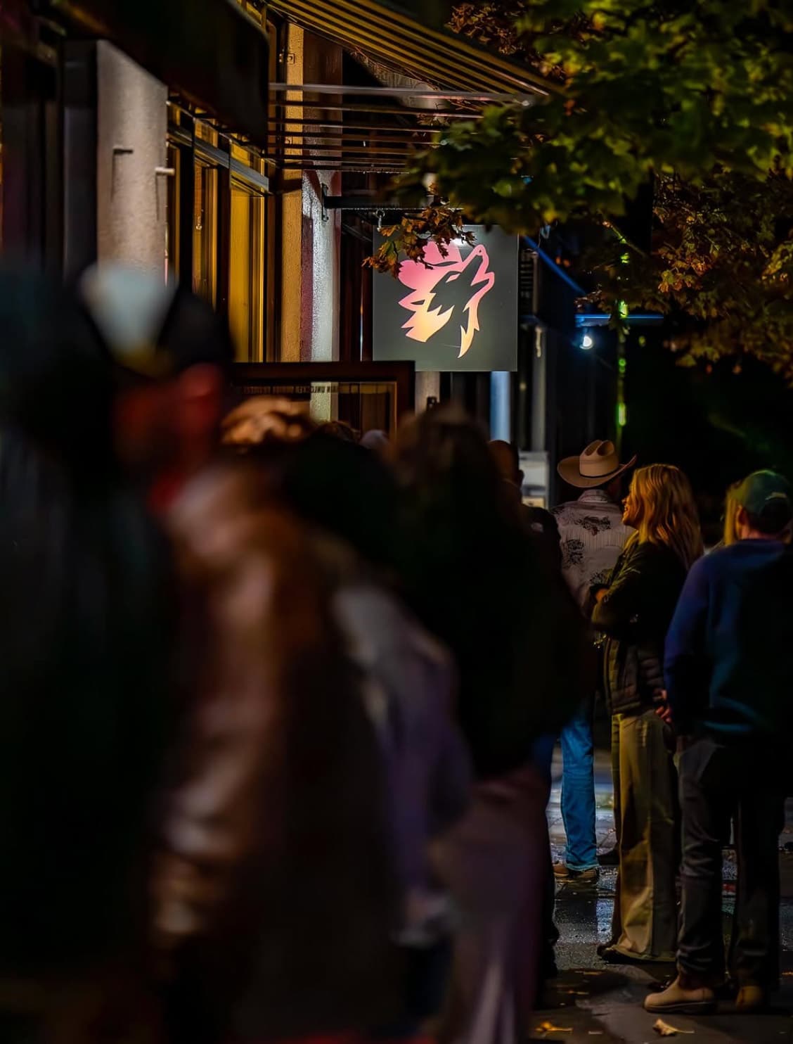 line waiting to get into Coyote Bar in Downtown Bend