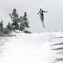 Skiier jumping at the 1965 Junior Olympics, held on Pilot Butte.