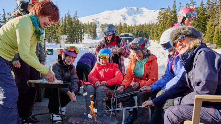 A group of women from Chix on Stix tailgating at Mt. Bachelor