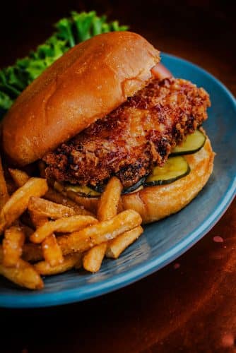 Lakeside Bistro burger on a plate with fries