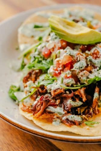 Taco salad on a plate at the row