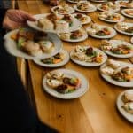 Bowtie Catering serving at an event