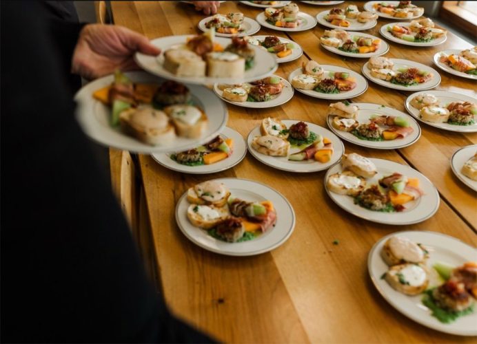 Bowtie Catering serving at an event
