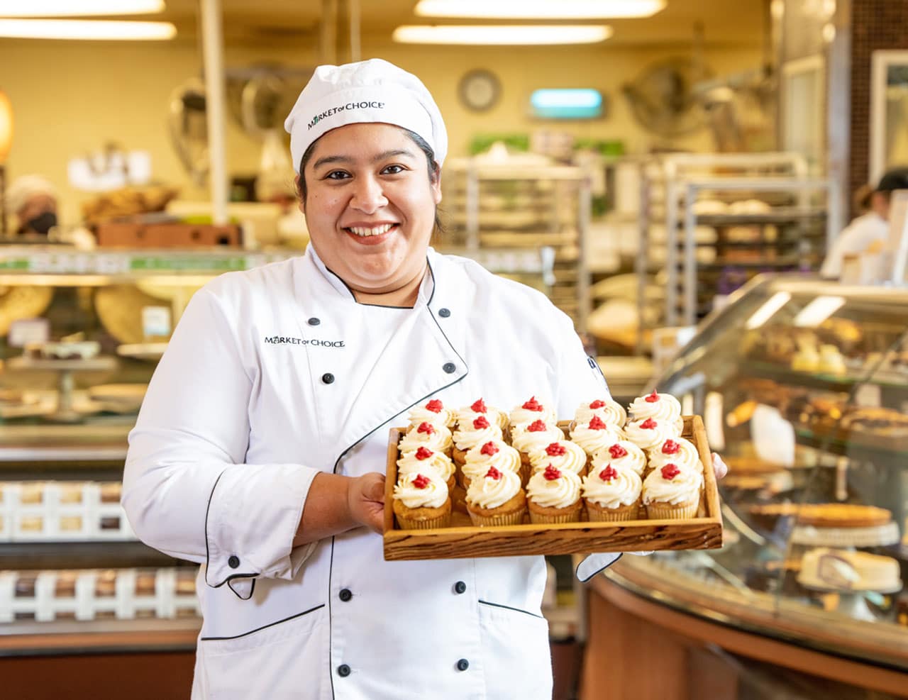 Baker with cupcakes