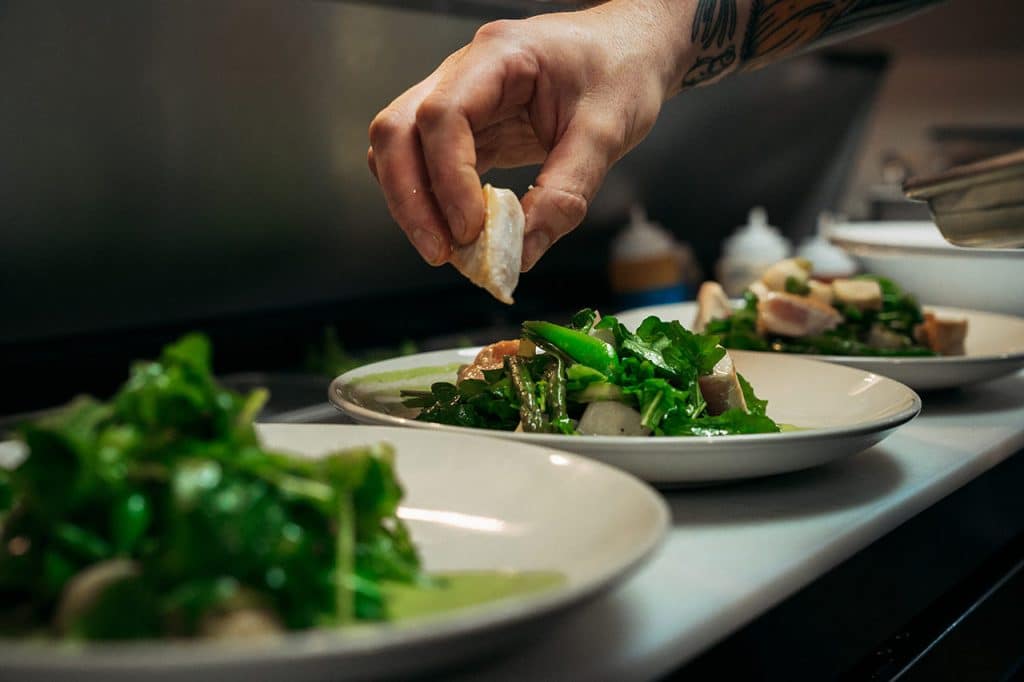 Feast Chef plating dishes