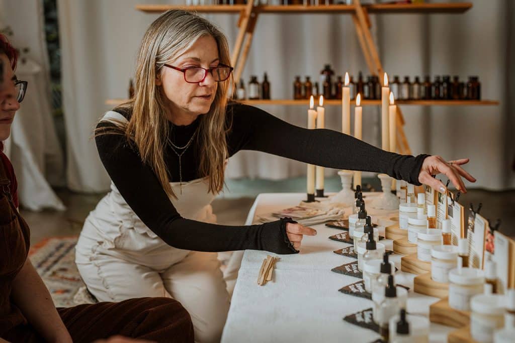 Kristine Ambrose making tinctures