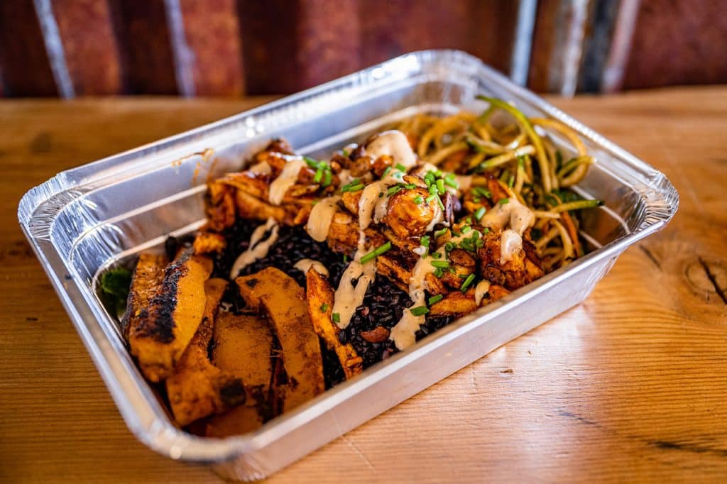Dinner to go on a tin plate from Luckey's Woodsman