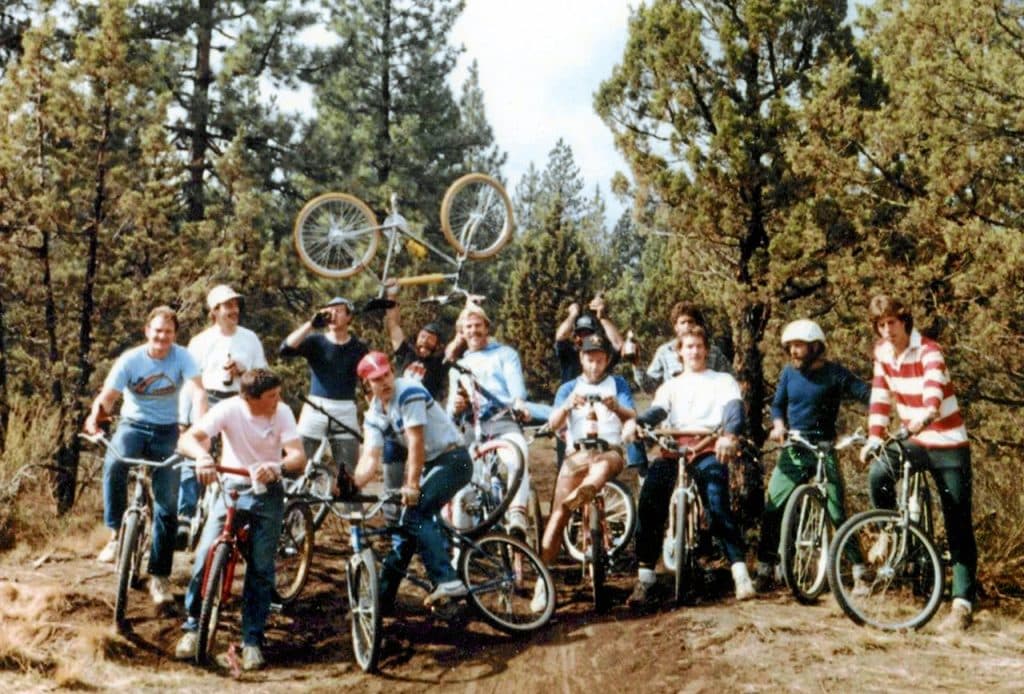 The Black Rock Riders (shown) led by Phil, Bob Woodward and Dennis Heater (center, with a bike overhead).