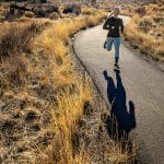 Runner staying safe on Shevlin Park Trail