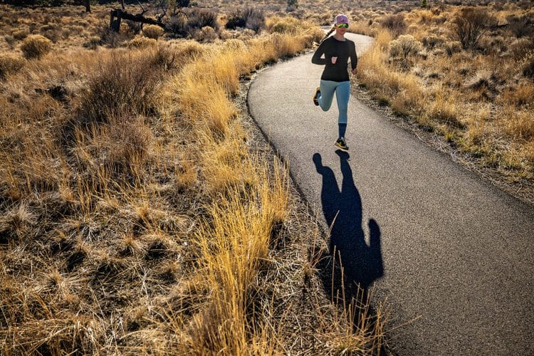 Runner staying safe on Shevlin Park Trail