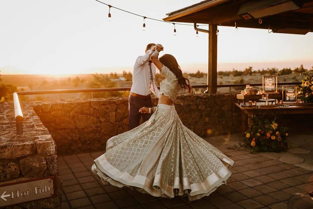 Couple spinning at wedding on Brasada Ranch