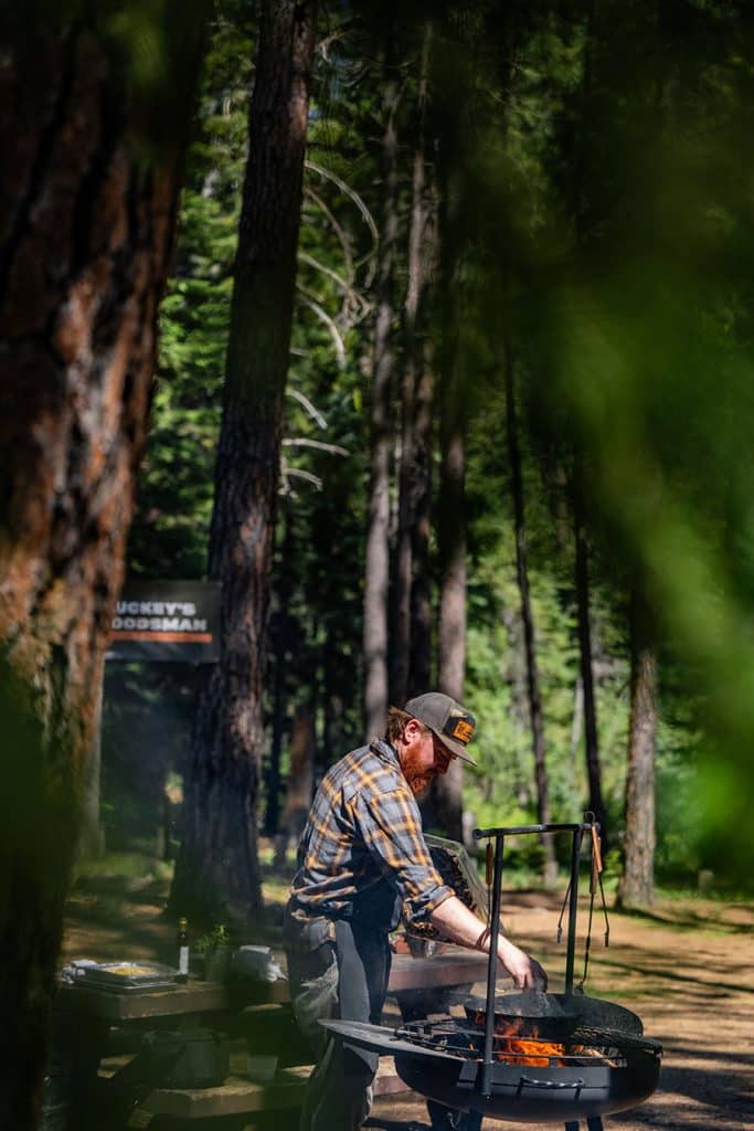 Luckey's Woodsman Off-Grid Provisions Chef prepares dinner outdoors