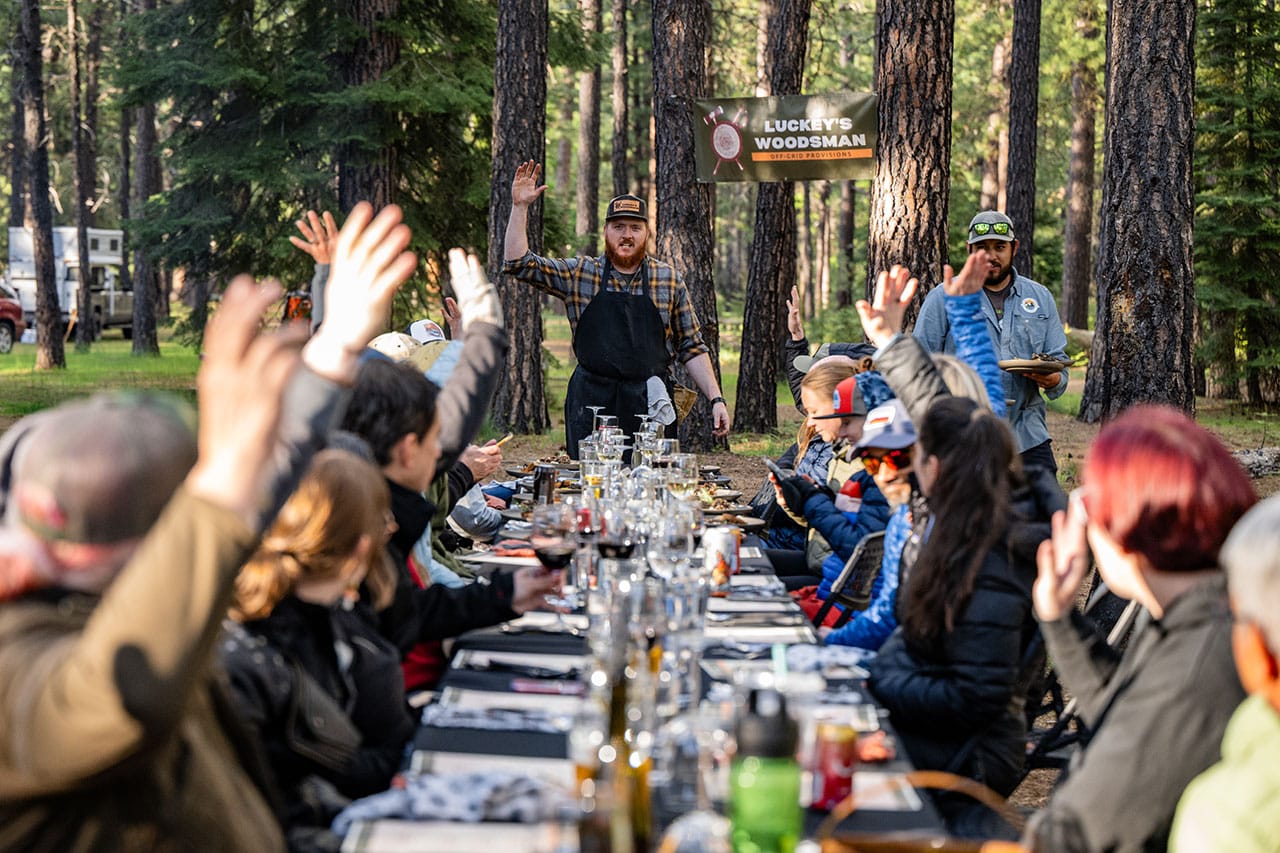 Seated dinner in the woods by Luckey's Woodsman