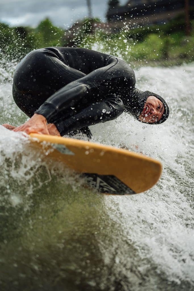 Surfing a white water wave
