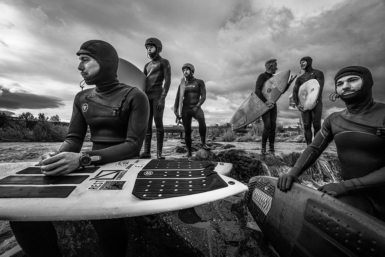 Surfers planning their moves on the water