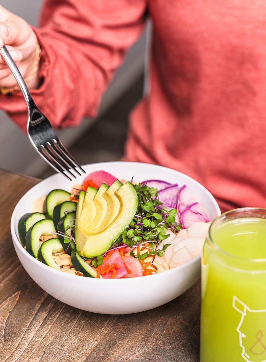 Someone enjoying a veggie bowl