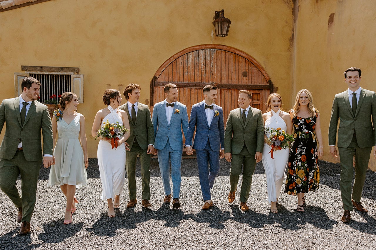 Wedding party smiling together