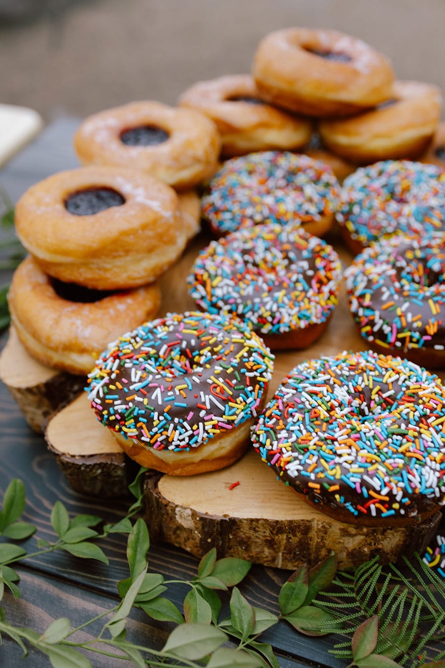 Glaze and sprinkle donuts at wedding