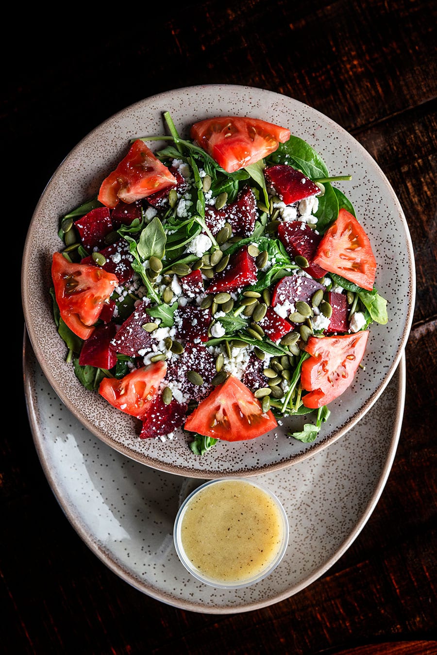 Colorful salad and dressing