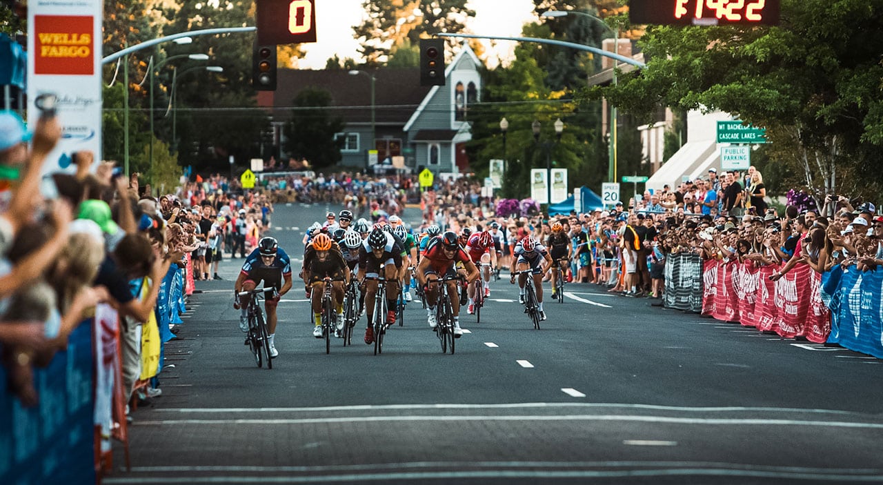 Cyclists sprinting for finish line.