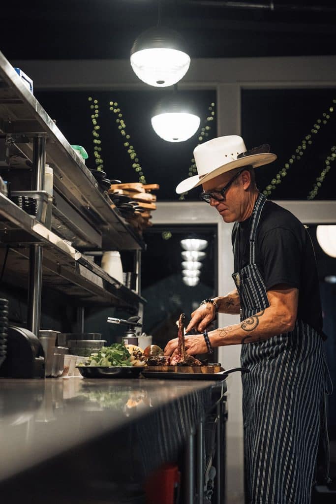 Brian Malarkey cooking in the kitchen at H&H