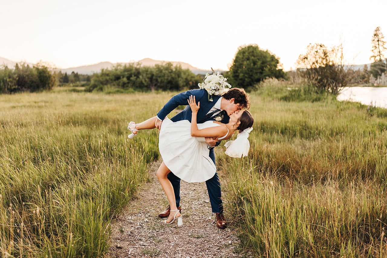 Wedding couple kissing at Black Butte Ranch