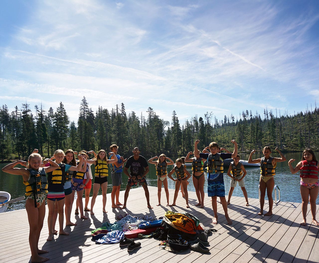 Kids posing strong on dock