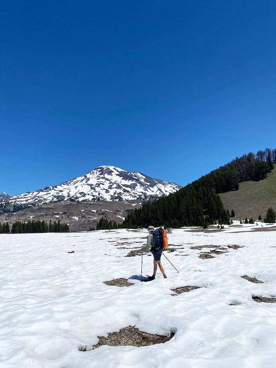 dad hiking across snow