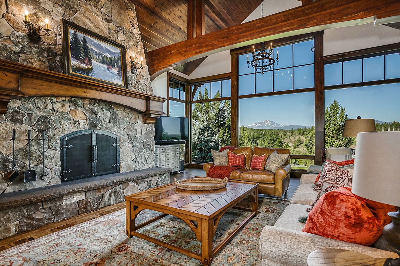 Living room and fireplace with open giant windows