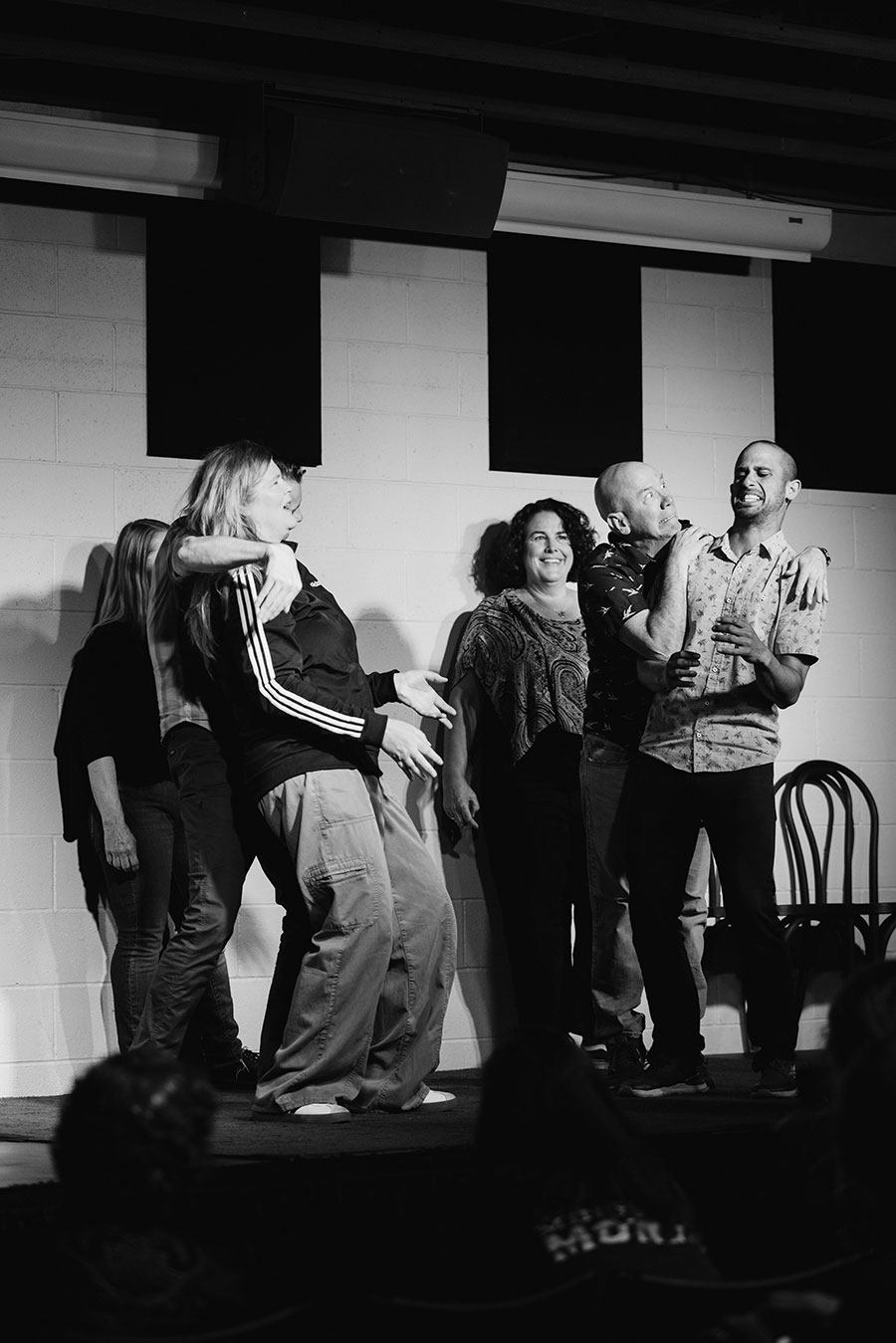 Improv actors performing on stage