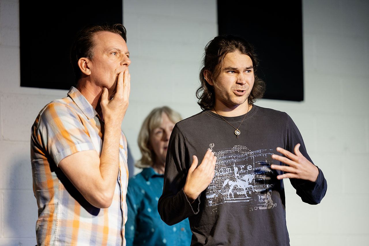 Improv actors performing on stage