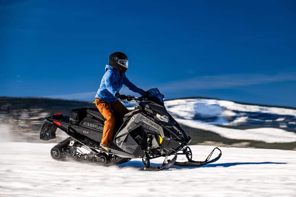 Snowmobile drive on the snow