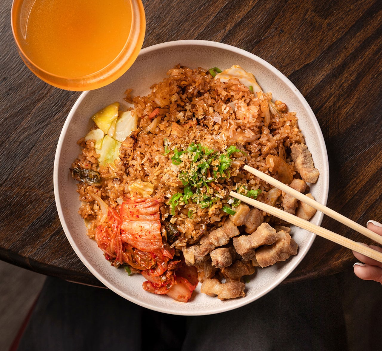 chicken rice bowl and cocktail on table from Yokocho Izakaya in Bend