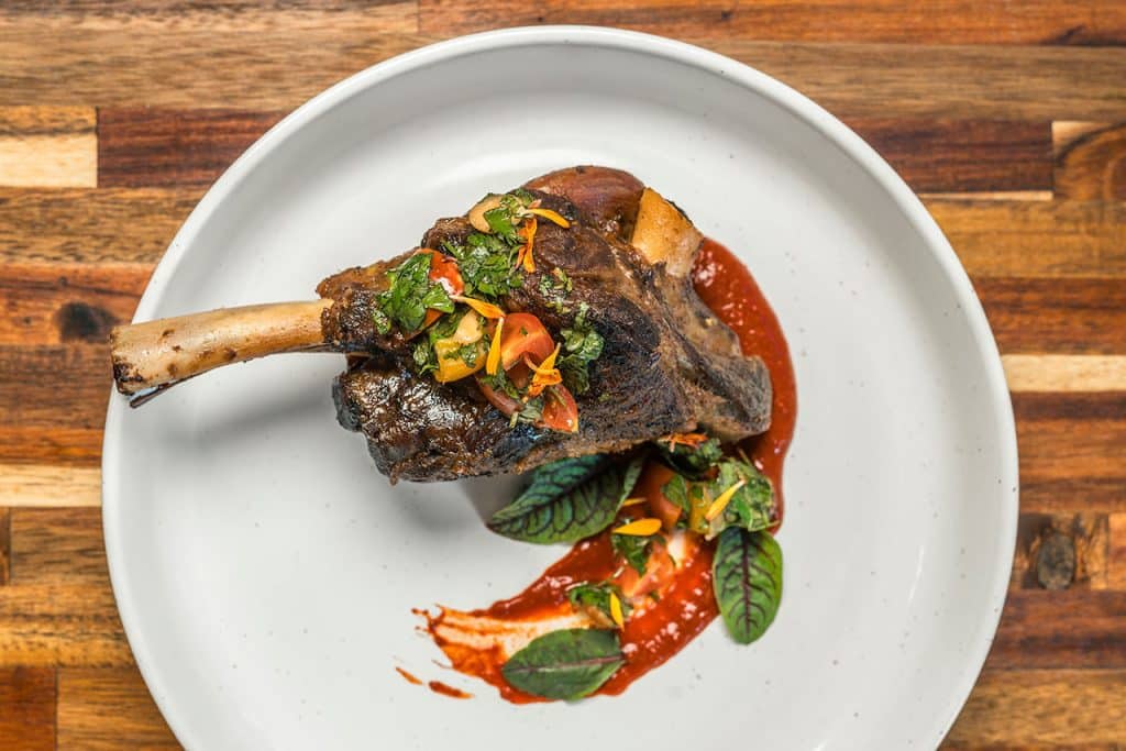 HOST SUPPER CLUB Bone in pork chop