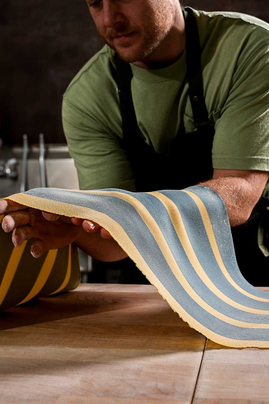 handmade pasta being laid out on counter