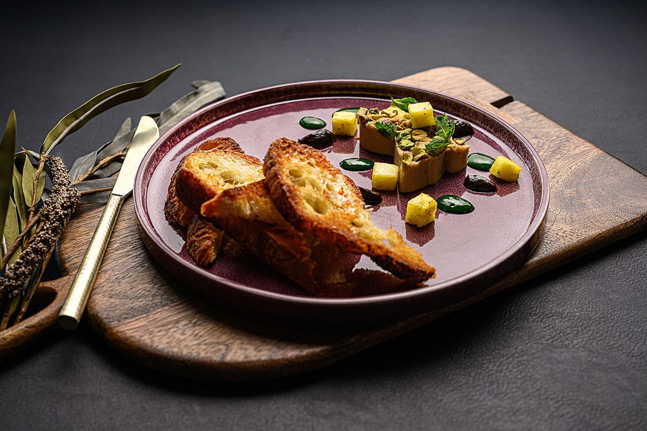 appetizer plate on wooden board at the hudson in bend