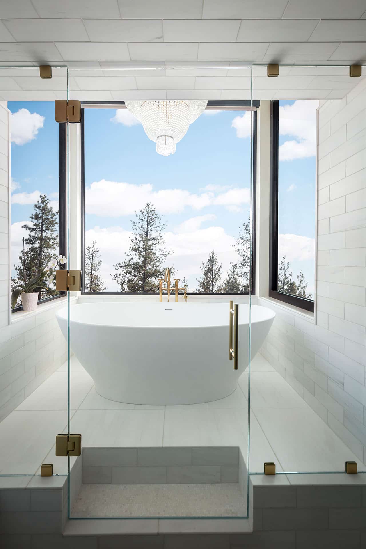 Likens Interior Design bathtub and shower with large windows