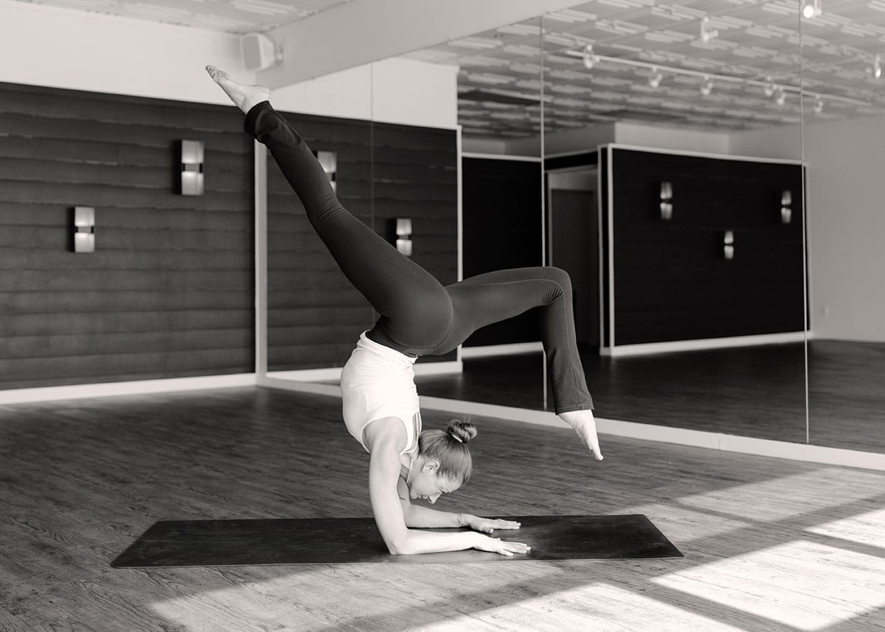 yoga pose on mat at yoga studio